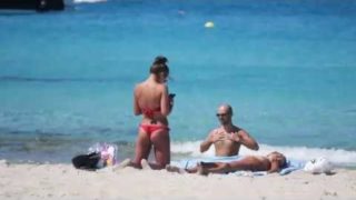 just loads of random nudity at the beach, some hot some not, try find the awesome naked milf