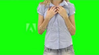 Sexy girl shows breasts close-up green screen l