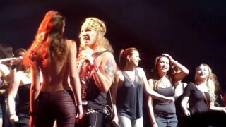 Skinny girl gets tits out at Steel Panther gig