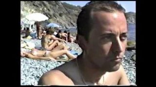 Home movie of topless sunbather