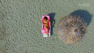 Drone spying on a nudist (0:27 or https://youtu.be/dGHw1bd5pPs?t=27)