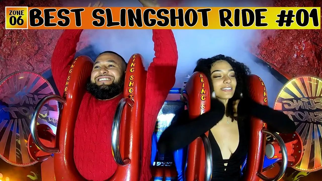 Boobs Pop Out On Sling Shot Ride