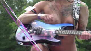 Playing guitar naked on stage