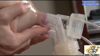 Mom Fills Two Bottles with Breast Milk