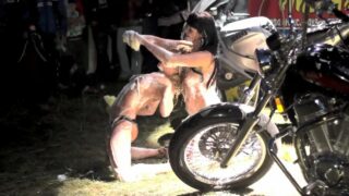 Topless motorcycle washing (0:45, “erotic dance for biker Bikeshow Russia 2012”)