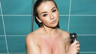 Melissa Debling takes a sexy shower (wet tshirt, 1:09)