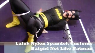 Batgirl is tied up and strapped to a vibrator in “Recent Bondage Latek Girl Orgasm On Catsuit”
