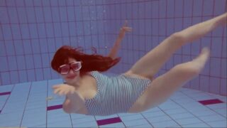 swimming girl under water, flashes on time stamp and at 55 seconds