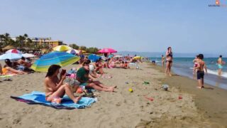Spain beach topless at 0:03