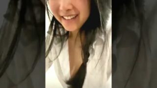 Nice downblouse slip at 2:15 in “A Chinese Lady Talks To Me Through Web-cam At Mid-night”
