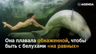 nude russian woman swim ice cold water at video starts