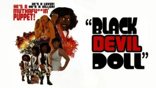Assaulted by a wooden puppet at 46:18 in “Black Devil Doll (2007)”