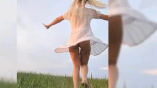 Walking in the field at sunset (See through pussy)