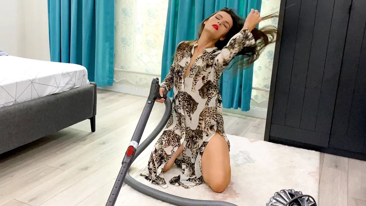 A Girl In A Leopard Transparent Dress Is Vacuuming 0:33 - YTboob