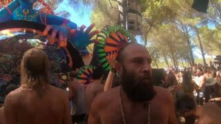 At start, 0:06, 0:25, 0:47, 0:57, 1:12, 2:15 topless hippies
