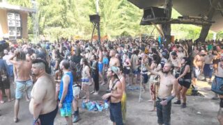 0:18 topless hippie dancing. Mo:dem Festival 2021 V1 Swamp Phobos