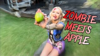 Cutting an Apple in Zombie Body Art Style at 0:00