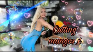 Slicing Mangoes in Blue Ice Girl Body Paint Style at 0:00