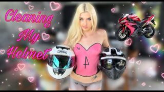 Cleaning Two Helmets in Pink Body Paint Trikot Style at 0:00