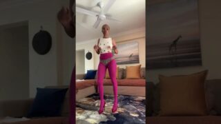 Woman with holes in shirt on nipples 0:01