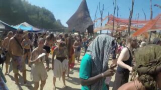 Topless hippie girls at 1:53, 2:09, 2:15 in the corner, 3:11, 4:38, 5:00 and 5:11 on Ozora festival