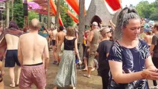 Topless girls at 5:09, 9:34 and 9:49 in Ozora festival