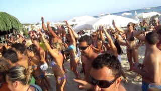 Tits on a beach at 1:54 and 5:00