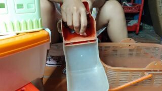 Just below the thing she’s cleaning – 6:10