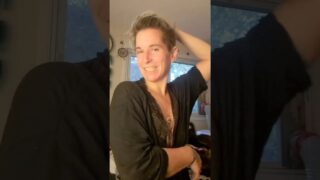 Woman with fucked up teeth plays with her tits and flashes at 3:30 while her dog is going crazy in the background