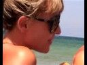 Beach. Topless women: 0:26 1:29